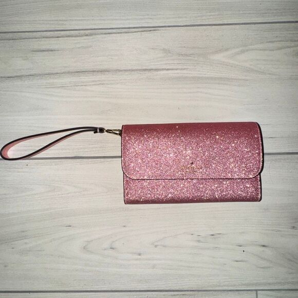 Kate Spade Glimmer Boxed Medium Flap Phone Wristlet Wallet  NWOT Kate Spade Glimmer or Tinsel Boxed Medium Phone Wristlet Wallet in a glitte